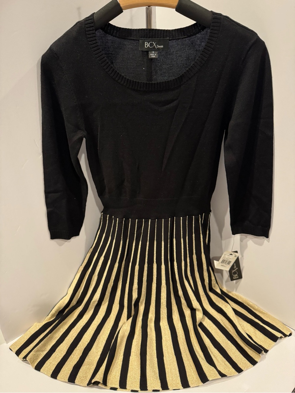 BCX Black Sweater Top with Gold & Black Striped Skirt